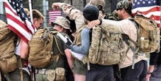 group of veterans huddled together